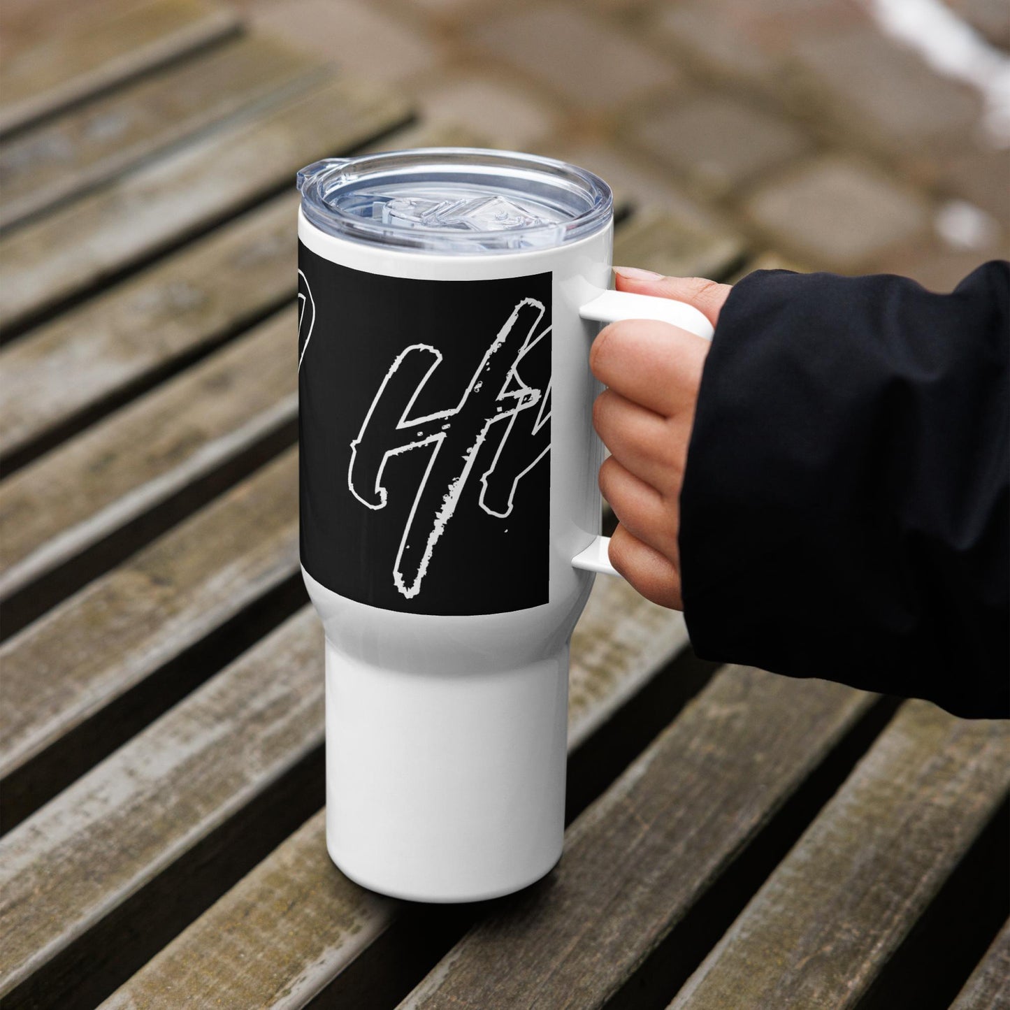 Travel mug with a handle